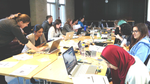 Group of undergraduate engineers learning about Arduinos and sensors