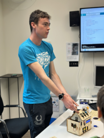 Terry Fawden demonstrating smart home sensors at Cambridge Festival