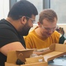 Sensor CDT students disassembling a pulse oximeter