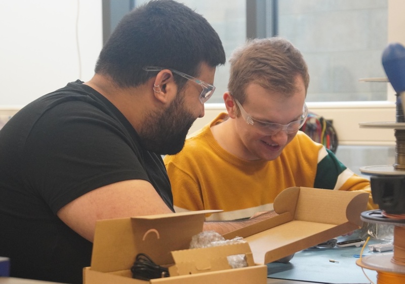 Sensor CDT students disassembling a pulse oximeter